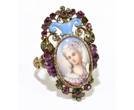 A 19th century yellow metal, enamel and gem set ring, the central porcelain plaque decorated with a portrait, (small chip), g
