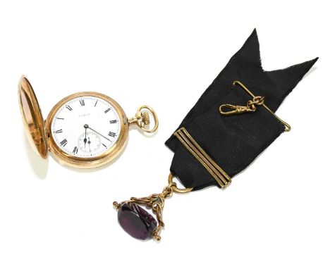 ELGIN; a gold plated crown wind full Hunter pocket watch, the outer case with chased decoration of swallows and a circular ca