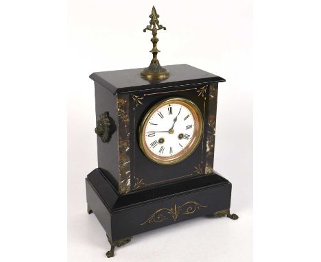 A Victorian marble and slate mantel clock with brass spike finial above the enamel dial set with Roman numerals, height 39cm.