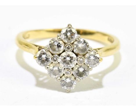 An 18ct yellow gold and diamond lozenge shaped cluster ring, the largest round brilliant cut stone approx. 0.10cts, size P, a