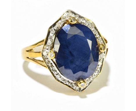 A large 9ct yellow gold sapphire and diamond cluster ring, size M, approx. 5.17g. 