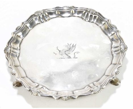 JOHN TUITE; a George II hallmarked silver waiter with cast scalloped edge on three hoof feet, London, 1742, weight 6.5ozt / 2