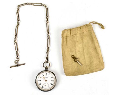 A 935 silver key wind open faced pocket watch, the enamel dial set with Roman numerals and subsidiary seconds dial, signed 'K