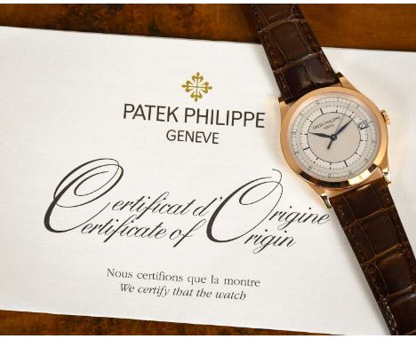 PATEK PHILIPPE; an 18ct rose gold Calatrava wristwatch, 5296R-001, with date aperture and Patek Philippe leather bracelet wit