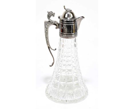 H BROS; an Elizabeth II hallmarked silver mounted cut glass claret jug with mythical creature to the handle, Sheffield 1973, 