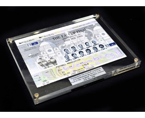 A Perspex block containing a ticket for the F.A. Cup Final 20th May 2000 presented by the Football Association to commemorate