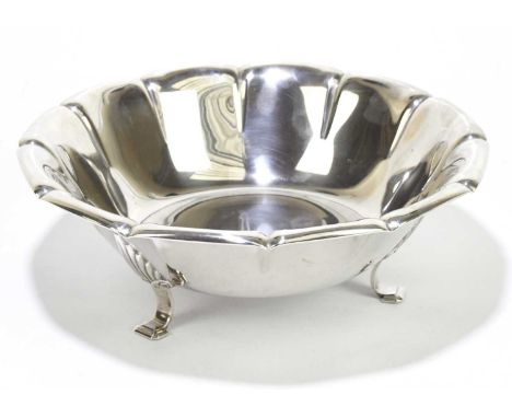 A Norwegian 830 grade silver footed bowl with panelled border on three Art Deco style scrolling feet, diameter 20cm, approx w