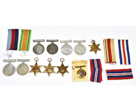 A group of medals, including two WWI medals awarded to 127416 Dvr. W. Green. R.E., 4784 Pte. J. L. Cunliffe. Ches. R., and va