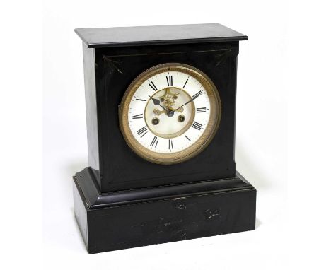 A Victorian slate mantel clock of rectangular form, the circular enamel dial set with Roman numerals, on plinth base, height 