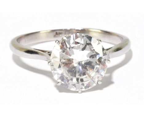 A platinum and diamond solitaire ring, the eight claw set round brilliant cut stone weighing 2.45ct, size N 1/2, approx 4g.Fo