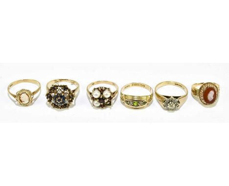 Four 9ct gold gem set rings, gross weight 8.5g, with a yellow metal gem set ring and a yellow metal garnet ring (6)