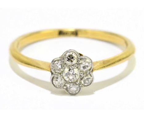 An 18ct yellow gold and diamond flower head ring, size M 1/2, approx. 2.2g.  