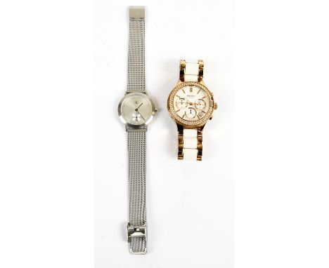 DKNY; a rose gold tone and white ceramic chronograph wristwatch with maker's logo to front and strap, no.255300, strap 14cm, 