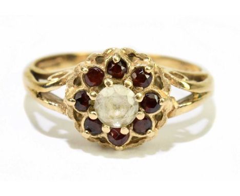 A 9ct yellow gold garnet set dress ring, size O 1/2, approx. 3.2g. 