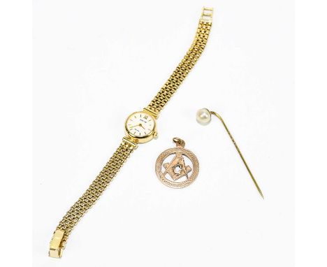 ACCURIST; a 9ct gold cased lady's wristwatch, the circular dial set with batons with 9ct gold mesh strap, approx weight 14.8g