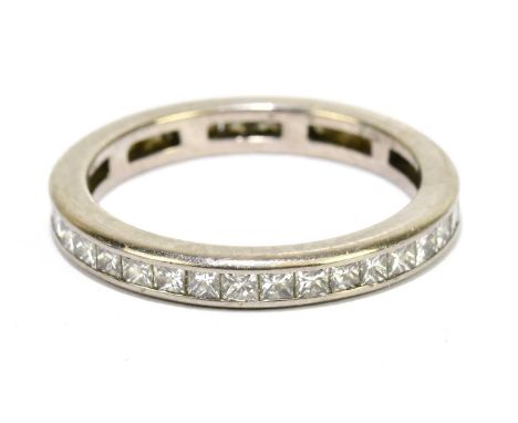 An 18ct white gold and diamond set full eternity ring, size M, approx. 3g. Condition Report: Width of the band approx. 2.5mm