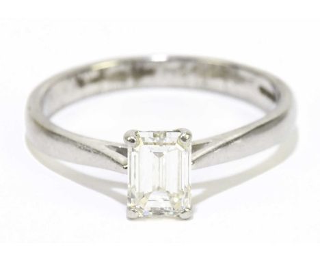 A platinum and diamond solitaire ring, the emerald cut stone approx. 0.50cts, size L, approx. 3.4g. 