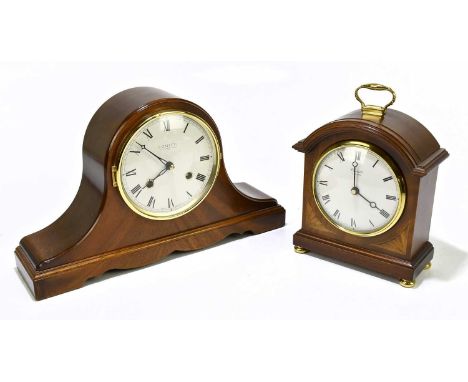 COMITTI, LONDON; a reproduction inlaid mahogany mantel clock, the circular dial set with Roman numerals, on four bun feet, he