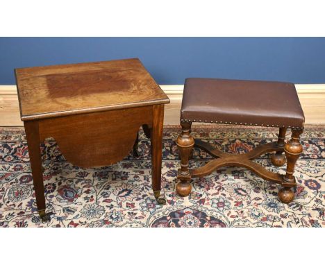 A 19th century mahogany commode on tapering block supports terminating on brass castors, with an oak framed X-stretcher stool