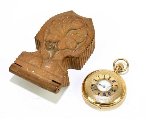 ELGIN; an American gold plated crown wind half Hunter pocket watch, the outer case with engine turned and enamel dial, diamet