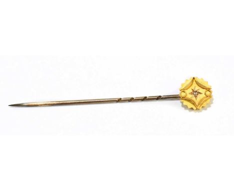 A stick pin with 15ct gold head centred with a tiny diamond and base metal pin, length approx. 50mm.