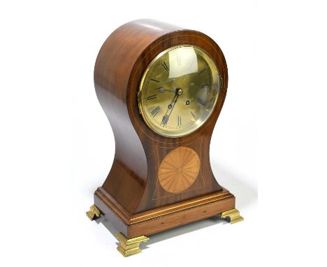 An Edwardian inlaid mahogany balloon mantel clock, the brass dial signed 'Tempus Fugit', with Roman numerals, on brass bracke