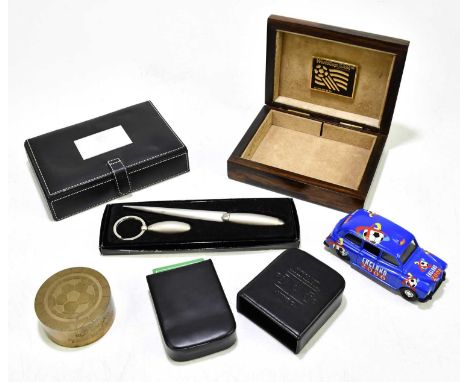 A group of collectors' items relating to England football, including a trinket box for World Cup USA '94, width 16cm, a leath