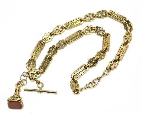 A 9ct gold fancy link double Albert, with pierced links and T-bar with yellow metal seal fob, weight without fob 54g.Conditio