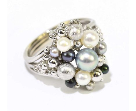 GEORG JENSEN; an 18ct white gold and pearl set pierced cluster ring, size M, approx. 7.8g. Condition Report: Signed 'G J Ld' 