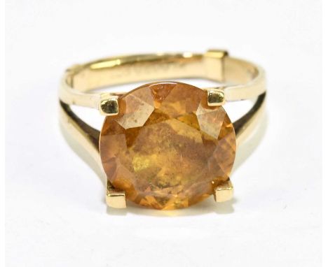 A 9ct yellow gold citrine set dress ring, size M, approx. 4.5g.