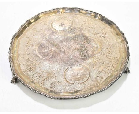 A George III hallmarked silver salver with shaped rim, London 1782, approx weight 865g/30ozt.Condition Report: Light tarnishi