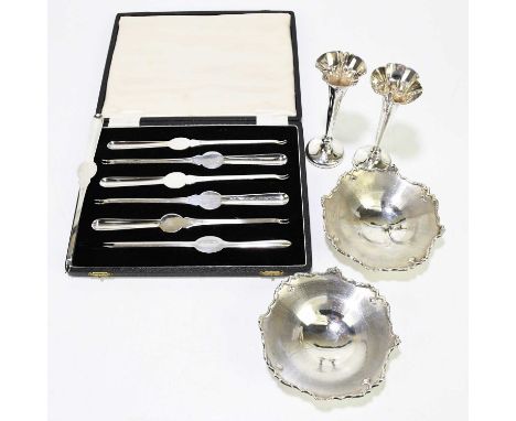 WALKER &amp; HALL; a pair of George V hallmarked silver footed bonbon dishes with cast scrolling rims and engine turned decor