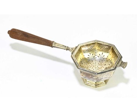 ASPREY &amp; CO; an Elizabeth II hallmarked silver tea strainer and bowl of octagonal form, with turned wooden handle, total 