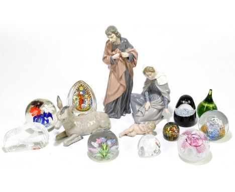 NAO; four nativity figures including Joseph, Mary and Jesus, with a selection of paper weights including Caithness limited ed