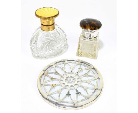 A Victorian hallmarked silver and tortoiseshell topped scent bottle, Birmingham 1849, together with a further enamel topped s