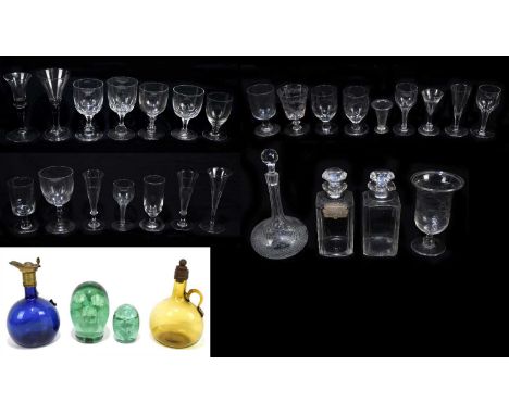 A collection of 18th century and later ceramic glasses and decanters, including a large conical shaped bowl with air detail s