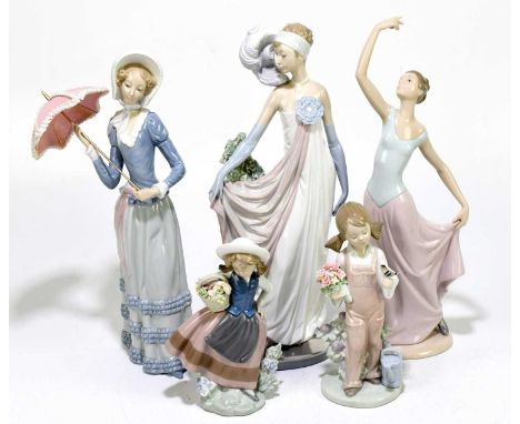 LLADRO; four figures to include two large examples, one modelled as an Edwardian lady with parasol wearing a bonnet, height 3