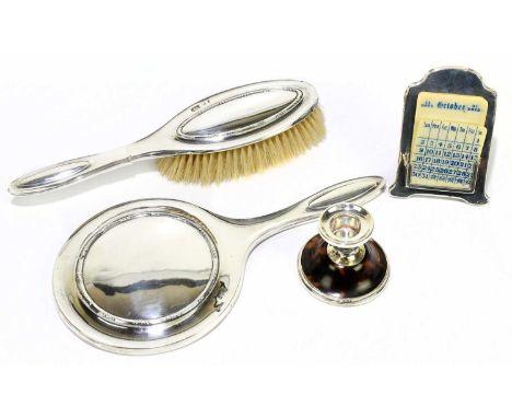 J&amp;R GRIFFIN; a George V hallmarked silver hand mirror together with matching hair brush, Chester 1919, together with a ha