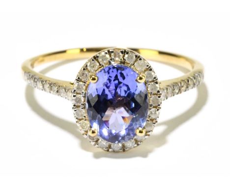 A 9ct yellow gold tanzanite and diamond ring, size R, approx. 2.4g. 
