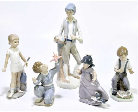 NAO; three figures to include a boy playing with a model plane, height 16cm, also two Spanish figures (5).