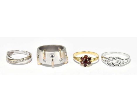 An 18ct yellow gold garnet set cluster ring, combined approx. 2.1g, and two 9ct white gold examples, approx. 4g, and a paste 