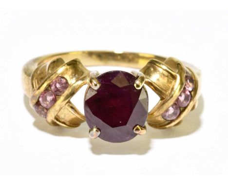 A 9ct gold ruby dress ring, aize M 1/2, approx. 4.25g. 