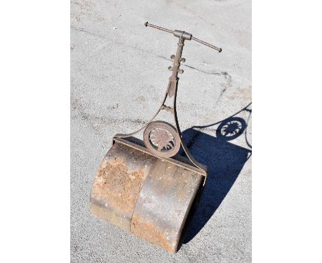 A Victorian cast and wrought iron garden roller.