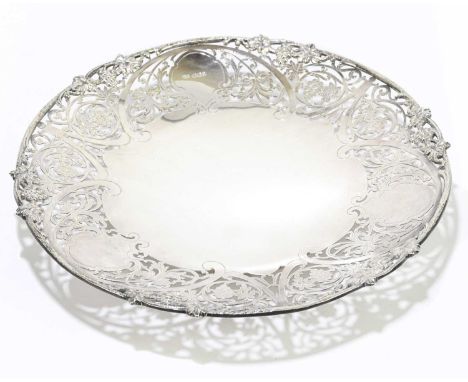 F. DRURY LTD; an Elizabeth II hallmarked silver cake stand with cast rim and pierced border of grapevine, scrolling detailing