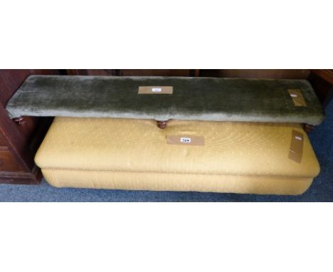 A green upholstered Victorian fender stool 129cm long and a Victorian style pouffe 112cm long (2)