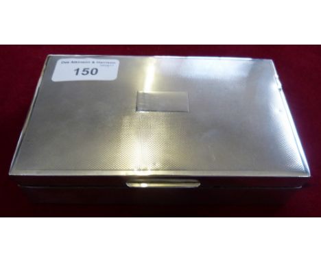 A silver cigarette box, Birmingham 1974, with engine turned cover 14 x 9 x 4cm