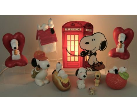 Snoopy - Collection of promotional items, comprising plastic telephone box, table lamp, 27cm high, a pair of molded bookends,