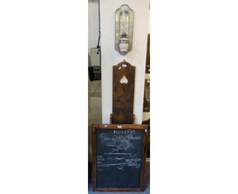 An Oil lamp in pewter wall mount together with wooden key rack and blackboard.