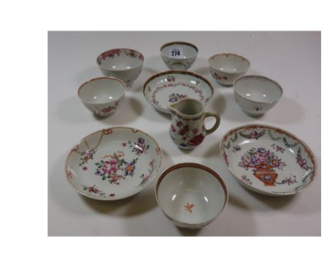 A collection of Chinese 'famille rose' tea bowls, saucers and a cream jug, Qianlong (10)