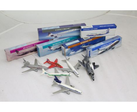 Six boxed commercial model airplanes to include BA Airbus A320, Concorde, Boeing 767, 747-400 & 777 and Boeing 737-500 plus a